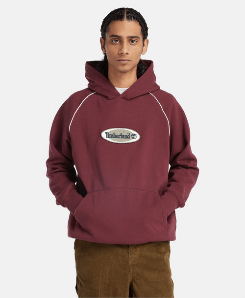 Sudadera tipo hoodie para hombre con parche de logo ovalado